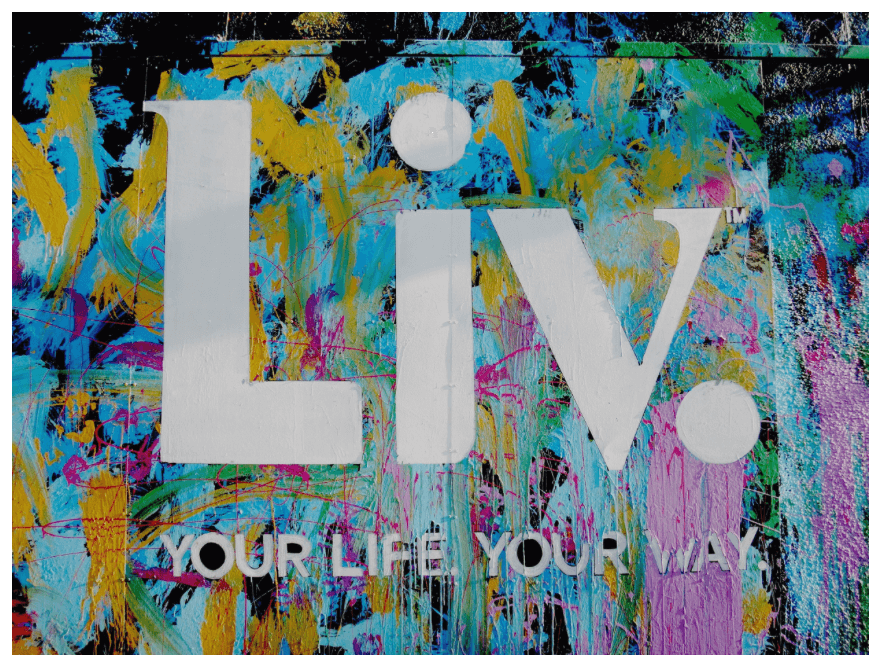Liv sign with colorful background promoting Gesundheit durch Lebensstil for a vibrant lifestyle.